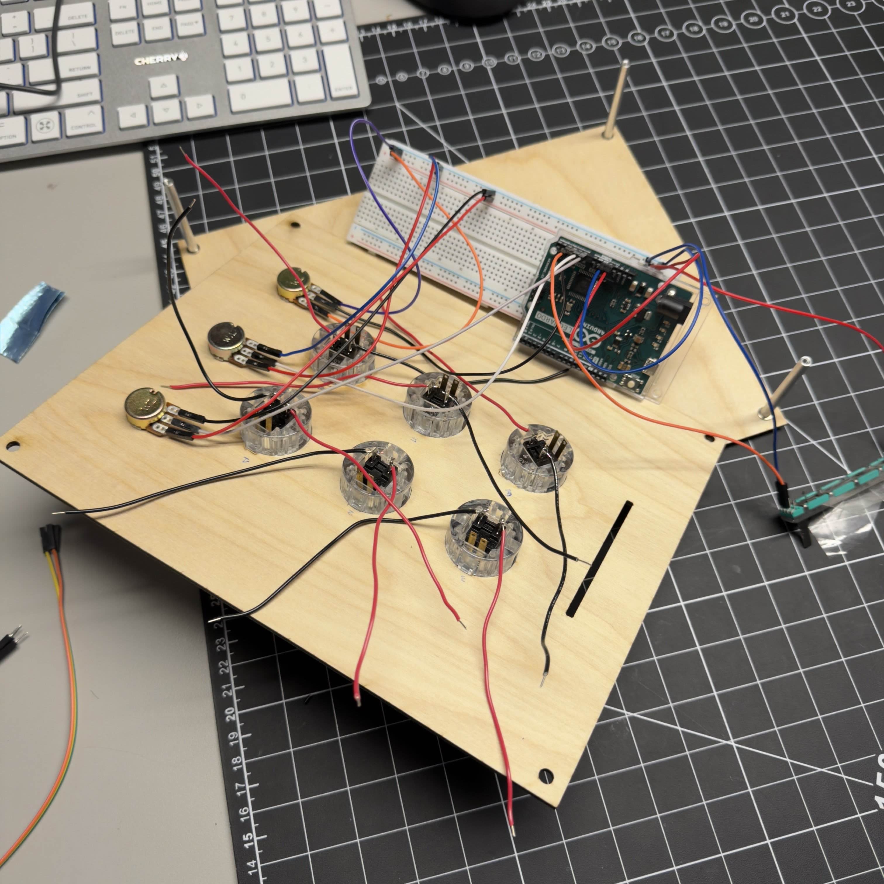 Internal wiring stage. After soldering the button connections, I routed the remaining wires to the Arduino and checked stability and consistency across all inputs.